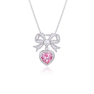 Open image in slideshow, &#39;Princess&#39; Bow and Crystal Heart Silver Pendant
